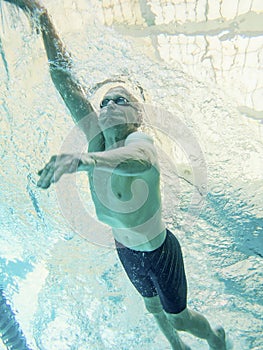 Older senior swimmer underwater