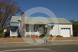 Older single car modest home photo