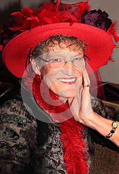 Older Smiling Red Hat Lady