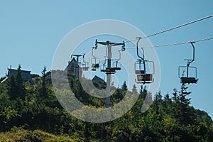 Older style ski lift on Velika Planina, Slovenia on a sunny summer day