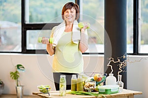 Older woman exercising indoors