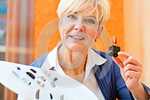 Deaf woman with hearing aid photo