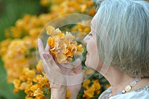 Older woman with flowers