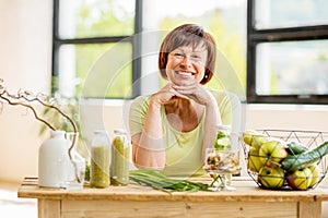 Older woman with healthy food indoors