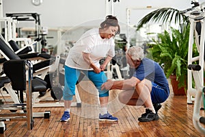 Older woman injured leg during fitness training.