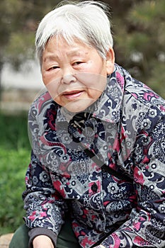 Older woman s portrait outdoor