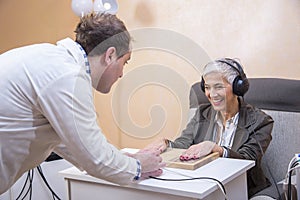 Older woman using alternative medicine