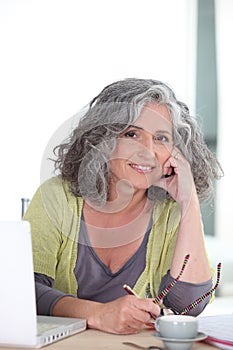 Older woman using a laptop