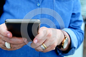 older woman using smart phone