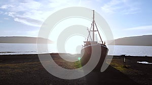 The oldest boat Gardar BA 64 in North West Iceland at sunset