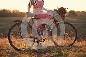 Oldfashioned girl and bike