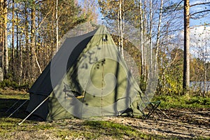 Oldschool camp tent in forest