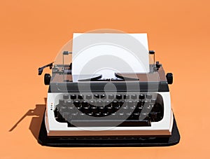 Oldschool typewriter with a blank page