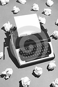 Oldschool typewriter and creased paper.