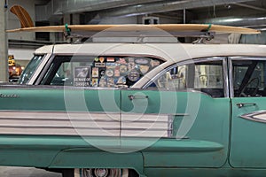 OldsMobile Fiesta Wagon Eighty Eight Produced in 1958 with Wooden Surf on Top photo