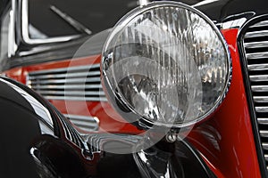 From oldtimer photo series: close-up of a red black oldtimer