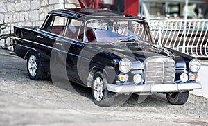 Oldtimer retro vintage car limousine at street