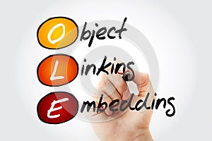 OLE - Object Linking and Embedding acronym with marker, technology concept background