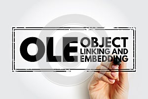 OLE Object Linking and Embedding - technology that allows embedding and linking to documents and other objects, acronym text stamp