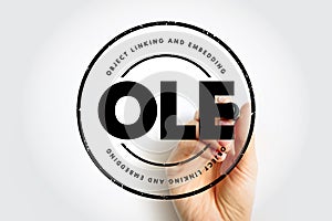 OLE Object Linking and Embedding - technology that allows embedding and linking to documents and other objects, acronym text stamp