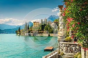 Oleander flowers and villa Monastero in background, lake Como, Varenna