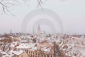 Oleviste Church View and Cathedral with Old Town towers in Tallinn, Estonia. Gothic Landmarks of Scandinavian city at