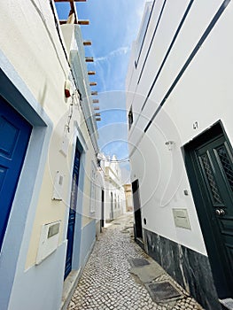 A typical street on Olhao, a city on Algarve region, Portugal.