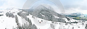 olidays in winter in Europe. Switzerland. Canton of Schwyz. Chalet in snow drifts