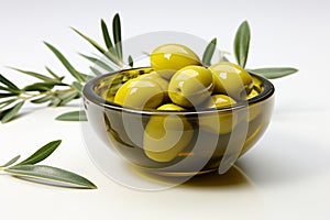 Olive bowls accented by charming olive twigs against a clean white backdrop