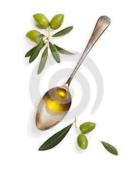 Olive fruit and spoon with olive oil