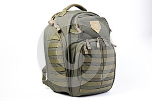 olive green tactical backpack with molle, on white