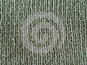 Olive green wool hand knitted texture abstract background