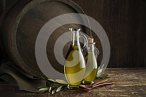 Olive oil with barrel background