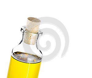 Olive oil bottle tilted on white background, isolated