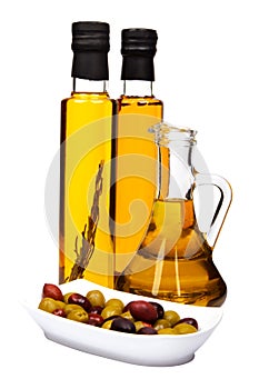 Olive oil bottles and olives.