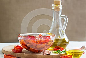 Olive oil, dried tomatoes, salt, herbs and spices