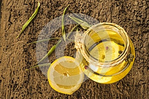 Olive oil flavored with lemon and red peppercorns