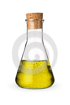 Olive oil in glass bottle with cork isolated on white