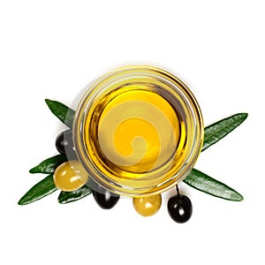 Olive oil. Greek olive oil in glass transparent bowl with marinated olives and leaves. Close-up, Isolated on white background