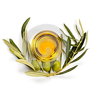 Olive oil. Greek olive oil in glass transparent bowl with olive branches with leaves and olives. Close-up, Isolated on white