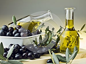 Olive oil and olives photo