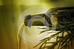 Olive oil pouring photo