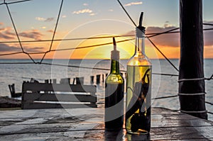 Olive Oil and Vinegar Bottle with Chili Pepper in the Holbox Island Sunset, Mexico