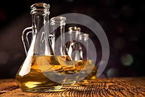 Olive oils in bottles with ingriedients