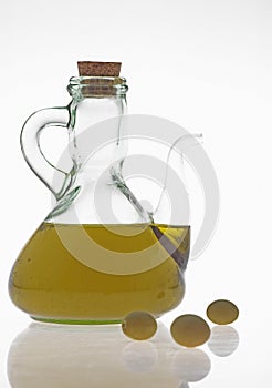 Olive, olea europaea, and Olive Oil against White Background