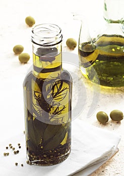 Olive, olea europaea, with Olive Oil Bottle