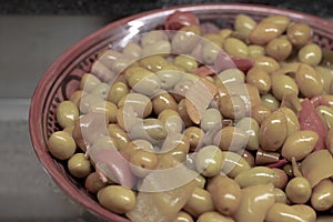 Olive, olive known by Olea Europaea In a pottery bowl