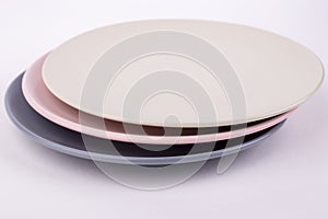 Olive, pink and gray plates isolate