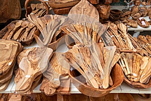 Olive wooden kitchen items in the market on the street