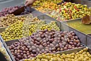 Olives. Of all varieties and in all shapes! Blacks, greens, bigs, little ones, Syrians, Arabs,